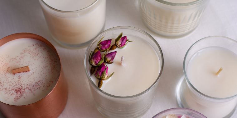 assorted scented soy candles in glass